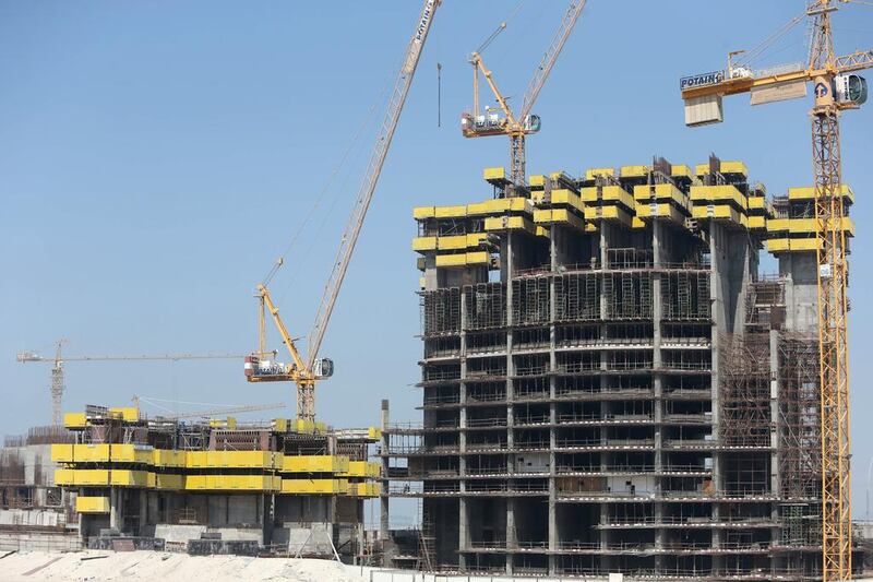 Stalled construction of Tameer Tower on Reem Island, Abu Dhabi. According to the law firm House of Justice representing some investors, one of cases against Tameer Holding has won compensation from the Dubai developer. Sammy Dallal / The National / March 6, 2014