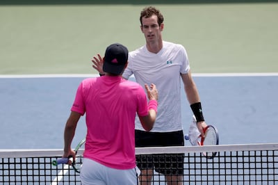 MASON, OH - AUGUST 13: Andy Murray of Great Britain shakes hands with Lucas Pouille of France after losing in three sets during Day 3 of the Western and Southern Open at the Lindner Family Tennis Center on August 13, 2018 in Mason, Ohio.   Rob Carr/Getty Images/AFP
== FOR NEWSPAPERS, INTERNET, TELCOS & TELEVISION USE ONLY ==

