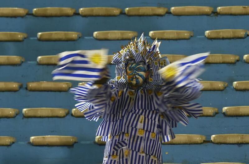 A fan of Uruguay waits for the start of the Russia 2018 FIFA World Cup football qualifier match between Uruguay and Paraguay in Montevideo. AFP