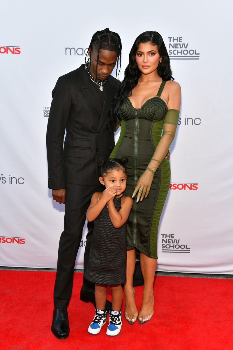 Travis Scott, Kylie Jenner, in a green body con dress, and Stormi Webster attend the 72nd Annual Parsons Benefit at Pier 17 on June 15, 2021 in New York City. Getty Images