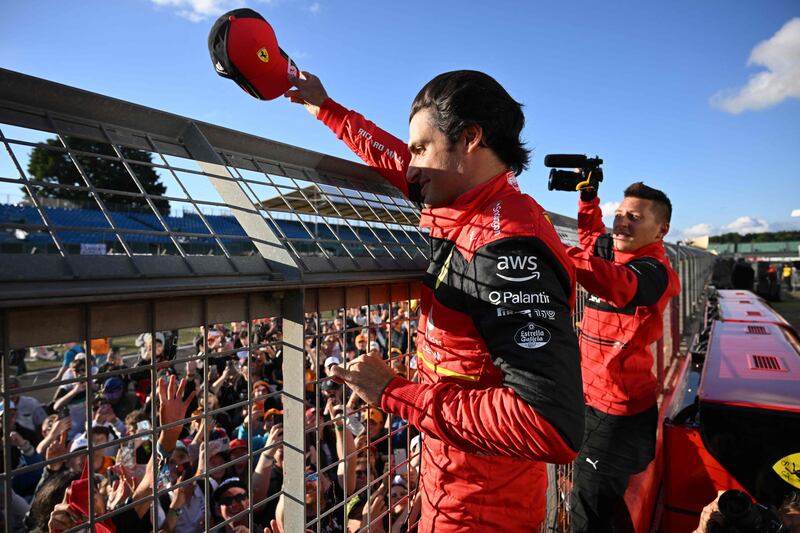 Ferrari's Carlos Sainz waves at fans after winning the British Grand Prix at Silverstone. AFP