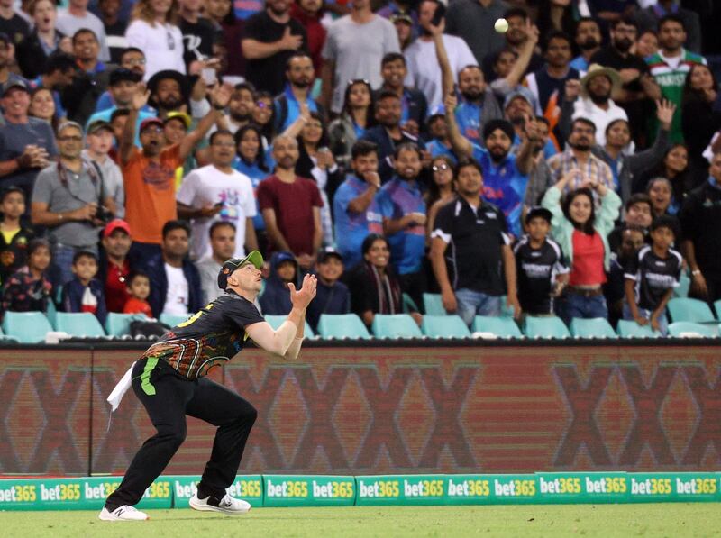 Australia's Daniel Sams misses a catch in the outfield. Reuters