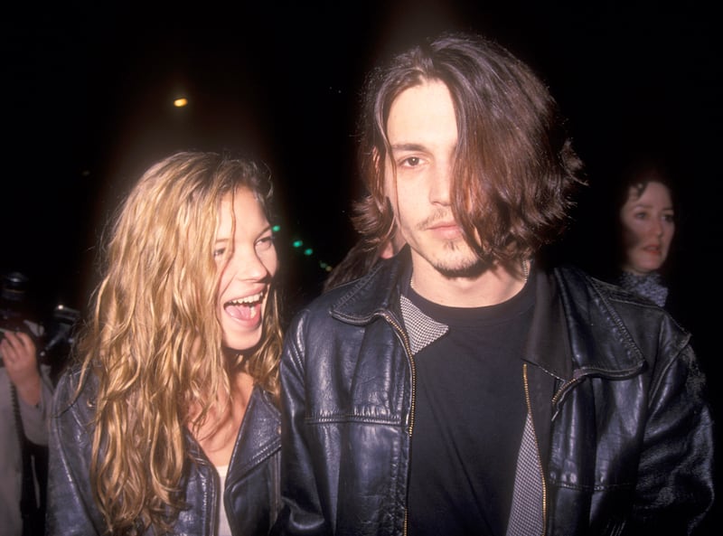 Model Kate Moss and actor Johnny Depp attend the screening of Depp's directorial debut, short film 'Banter', on February 22, 1994, at Smashbox Studios in Culver City, California. Getty Images