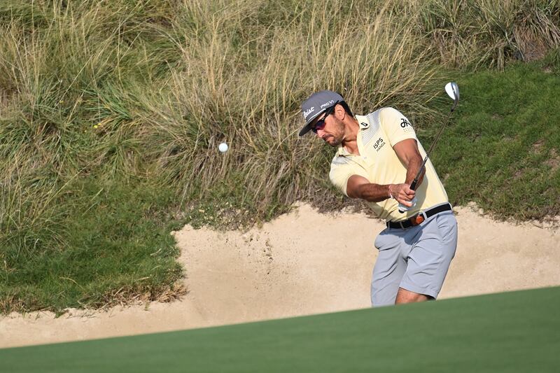 Rafa Cabrera Bello of Spain plays a bunker shot onto the second green during a practice round at Yas Links Golf Course. Getty Images