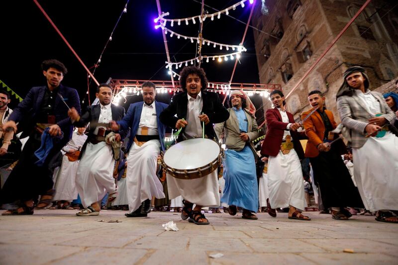 Yemenis dance at a wedding ceremony in the old city of Sanaa. AFP
