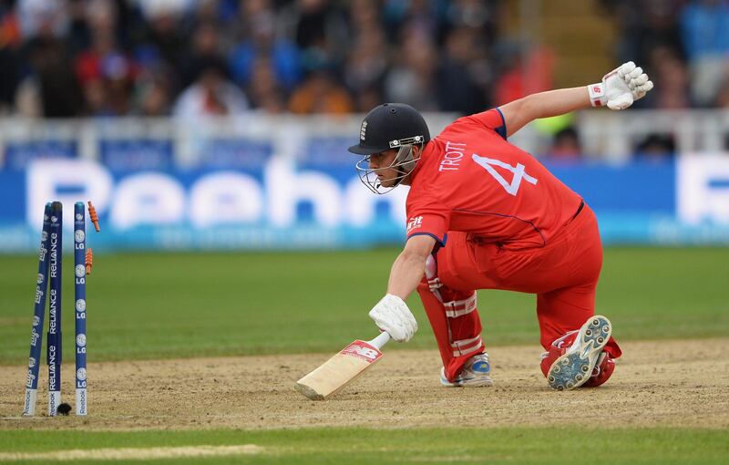 BIRMINGHAM, ENGLAND - JUNE 23:  Jonathan Trott of England is stumped by Mahendra Singh Dhoni of India during the ICC Champions Trophy Final between England and India at Edgbaston on June 23, 2013 in Birmingham, England.  (Photo by Gareth Copley/Getty Images) *** Local Caption ***  171216286.jpg