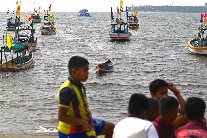 Boats anchored near a logo of Mumbai Indians team in the Arabian Sea. AFP