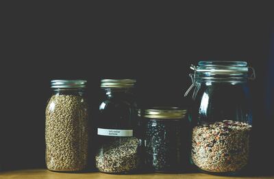 Glass jars are better options than plastic containers. Unsplash