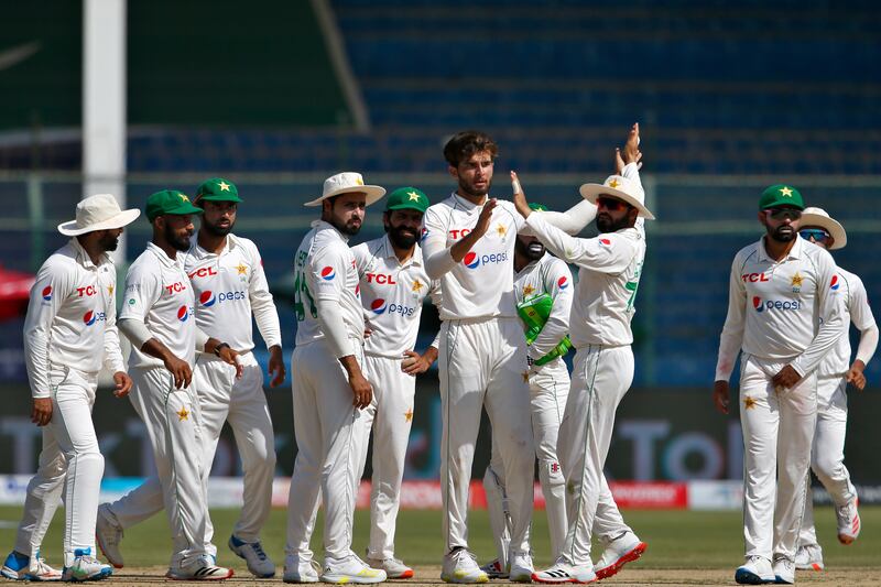 Pakistan's Shaheen Shah Afridi, centre, celebrates with teammates after the dismissal of Marnus Labuschagne. AP