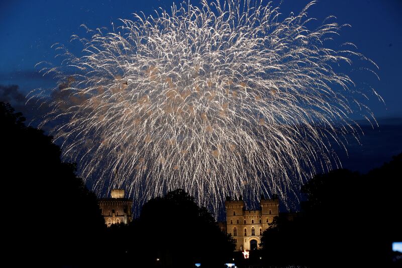 Fireworks explode above Windsor Castle during the lighting of the principal platinum jubilee beacon ceremony during the Queen Elizabeth II's platinum jubilee celebrations in Windsor, Britain, June 2, 2022. Reuters