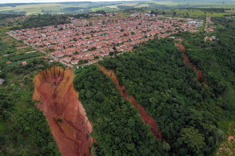 Erosion threatens the town of Buriticupu in Brazil. The phenomenon of 'vocorocas', or torn earth, is caused by a lack of urban planning and aggressive deforestation. AFP