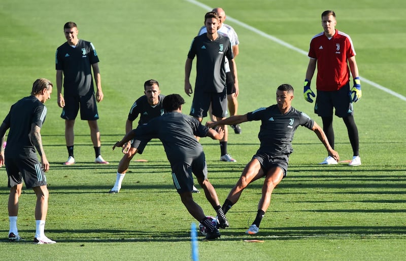 Juventus' Cristiano Ronaldo and teammates during training in Turin ahead of their Champions League last-16 second leg against Lyon. Reuters