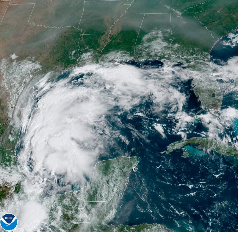 A satellite image shows Tropical Storm Nicholas in the Gulf of Mexico on Sunday. National Oceanic and Atmospheric Administration via AP