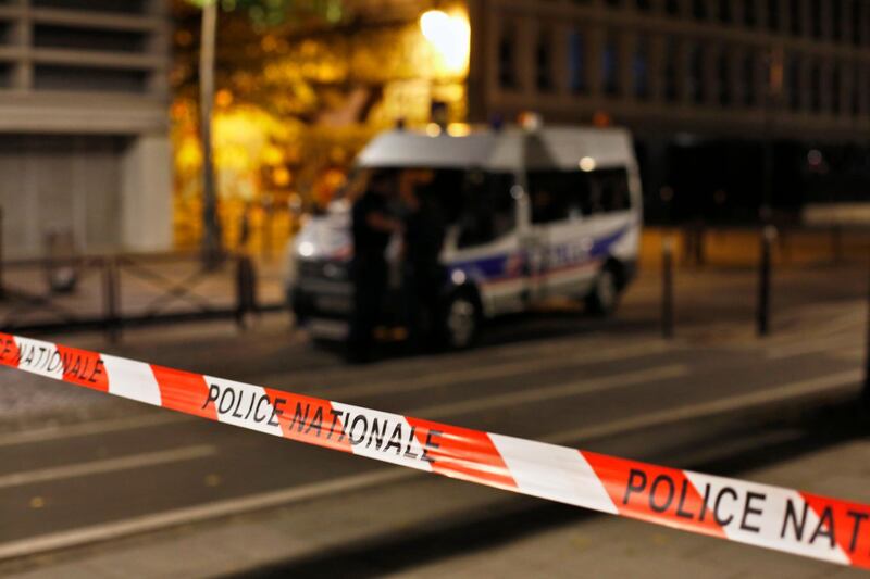 Police secures the site of a knife attack in Paris, Monday, Sept. 10, 2018. A several people were injured in a knife attack in central Paris late Sunday but police said that terrorism was not suspected. (AP Photo/Thibault Camus)