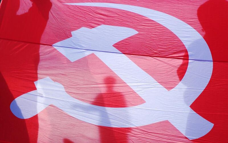 People hold a Soviet flag as they take part in a pro-Russian rally in the Black Sea Ukrainian city of Odessa. Alexey Kravtsov / AFP 