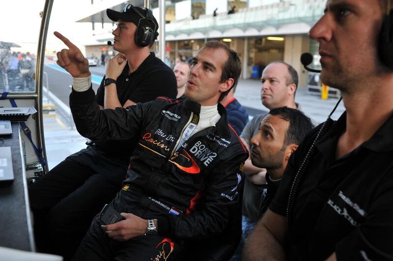 Jerome Bleekemolen examines qualifying results at Yas Marina Circuit on Thursday. Delores Johnson / The National