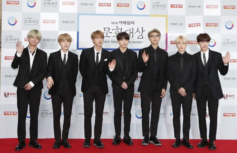 epa07398418 South Korean boy band 'Bangtan Boys, BTS' membes attends the Edaily Culture Awards at the Sejong Cultural Center in Seoul, South Korea, 26 February 2019. Edaily Culture Awards is an award ceremony that awards works that have contributed to the Korean performing arts industry.  EPA/KIM HEE-CHUL