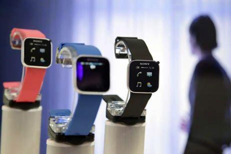 Many people have stopped wearing watches but the likes of Sony's SmartWatch could tempt them back. Tobias Schwarz / Reuters