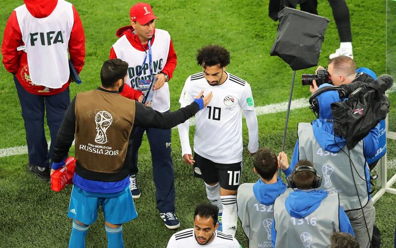 Mohamed Salah leaves the pitch after defeat to Russia. Mahmoud Khaled / EPA