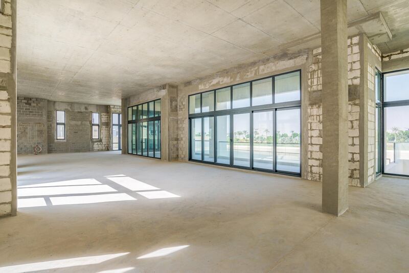 Light filters in through the large windows. Courtesy Luxury Property