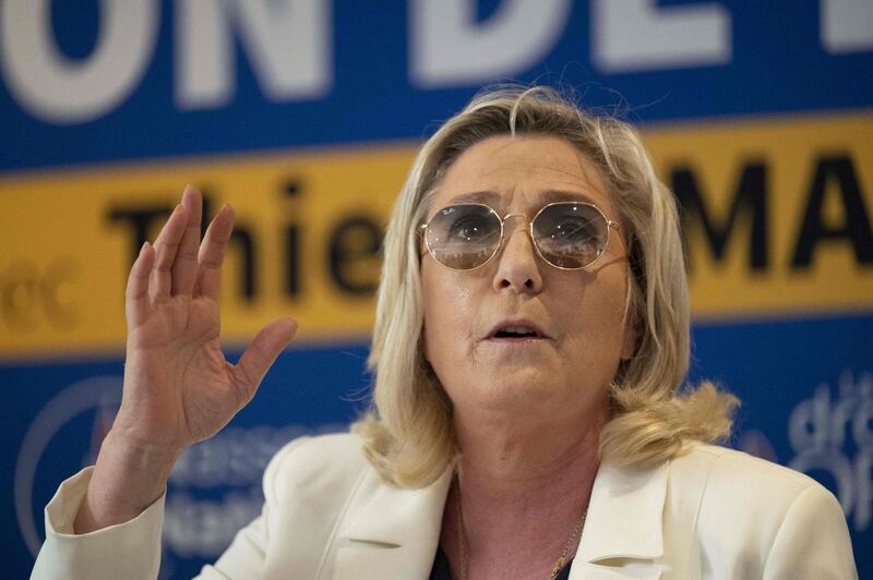 French far-right Rassemblement National (RN) party's leader and member of parliament Marine Le Pen (R) gives a press conference during a support visit to RN top candidate in Provence-Alpes-Cote d'Azur (PACA) for the upcoming regional elections as part of the campaign in Toulon, southern France, on June 17, 2021.  / AFP / Christophe SIMON
