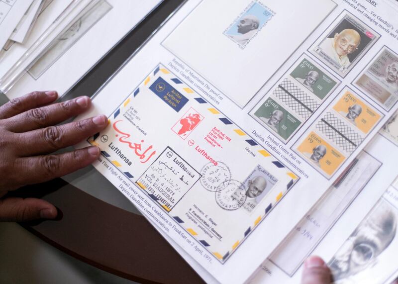DUBAI, UNITED ARAB EMIRATES - JULY 25 2019. Ummer Farook browses his Ghandi stamps collection.
Umer won a silver award for his collection on Gandhi at a recent international exhibition in China. His award winning collection on Gandhi shows stamps issued by more than 100 countries with images of the non-violence leader as a young law student and leading India’s independence struggle against British colonial rule. More than 20 countries have issued stamps over the past year to commemorate the 150th birth anniversary celebrations that began in October last year.

(Photo by Reem Mohammed/The National)
 
Reporter: RAMOLA TALWAR
Section: NA