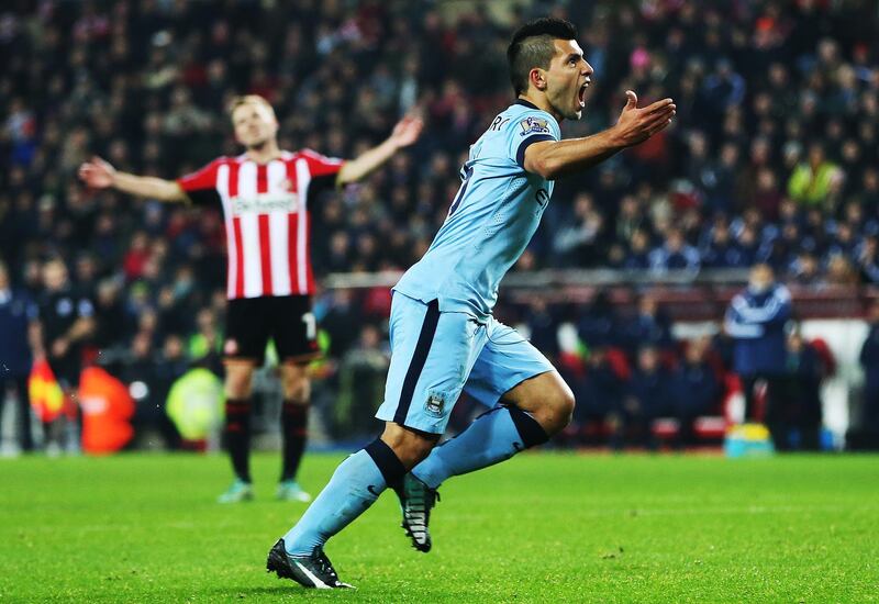 Manchester City's Argentinian striker Sergio Aguero celebrates scoring their first goal during the English Premier League football match between Sunderland and Manchester City at The Stadium of Light in Sunderland, north east England on December 3, 2014.  AFP PHOTO / IAN MACNICOL

RESTRICTED TO EDITORIAL USE. No use with unauthorized audio, video, data, fixture lists, club/league logos or “live” services. Online in-match use limited to 45 images, no video emulation. No use in betting, games or single club/league/player publications. (Photo by Ian MacNicol / AFP)