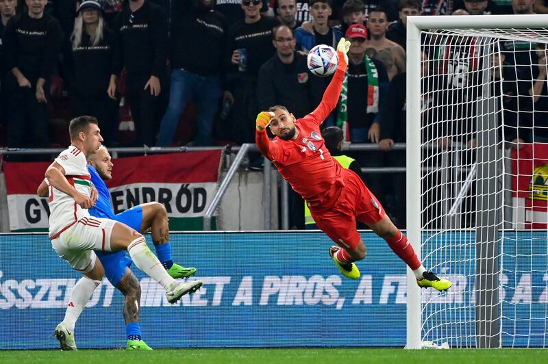 Italy goalkeeper Gianluigi Donnarumma makes a save. AP