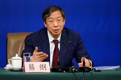 Yi Gang, deputy governor of the People's Bank of China (PBOC), attends a news conference on the sidelines of China's National People's Congress (NPC) in Beijing, China March 9, 2018. Picture taken March 9, 2018. REUTERS/Aly Song