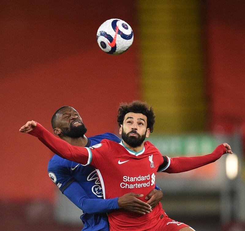 Liverpool striker Mohamed Salah is challenged by Chelsea defender Antonio Rudiger during the Premier League match at Anfield on Thursday, March 4. Chelsea won the match 1-0. Reuters