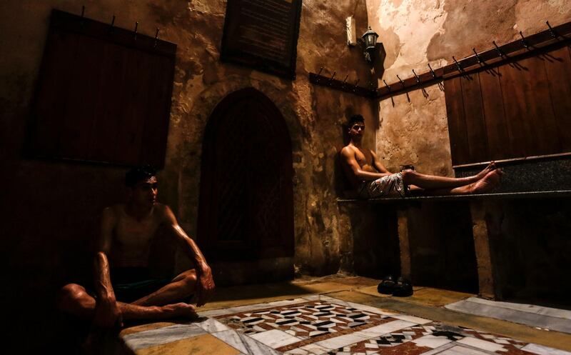 Palestinian men relax at the ancient Turkish steam bath in Gaza city. AFP