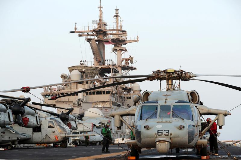 US aircraft are seen on the flight deck.