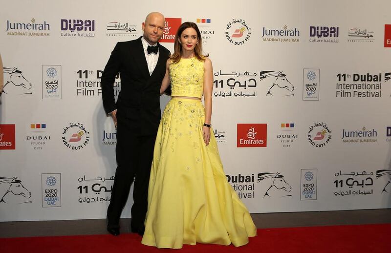 Mark Foster and Emily Blunt on the red carpet on the opening night of 11th Dubai International Film Festival. Pawan Singh / The National 