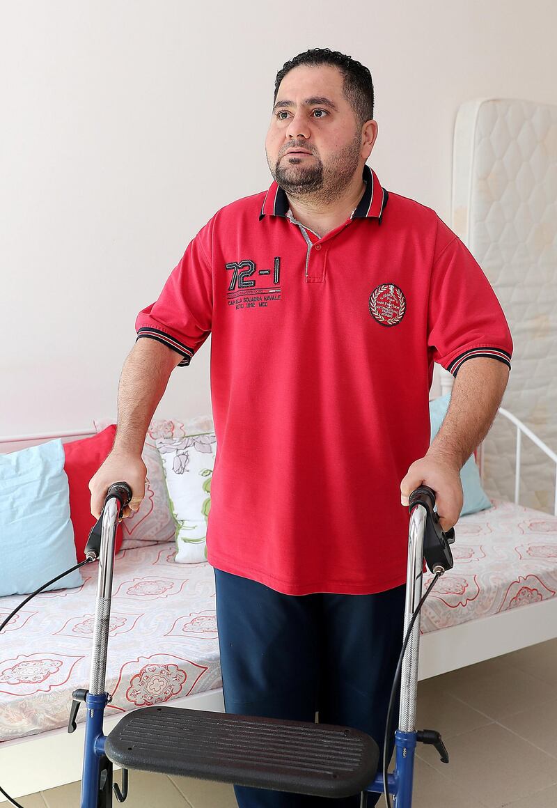 ABU DHABI, UNITED ARAB EMIRATES, September 1 – 2018 :- Nedal Hboubati ( 38 years old ) who is suffering from multiple sclerosis and need donations to pay for his treatment at his home in Abu Dhabi. ( Pawan Singh / The National )  For News. Story by Shareena 