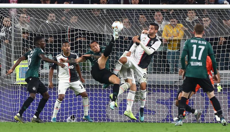 Federico Santander of Bologna FC performs an overhead kick during the Serie A match between Juventus and Bologna FC at Allianz Stadium in Turin, Italy. Getty Images