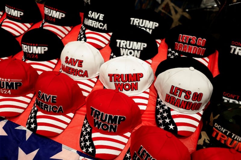 A liberal voter in Georgia said that Trump supporters have made it impossible to ever wear a red hat again. Reuters