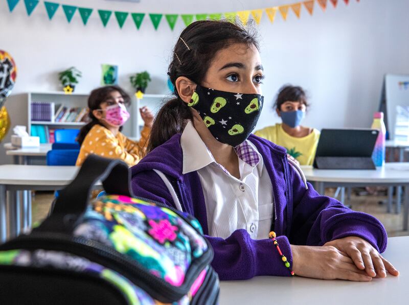 Pupils listen to their teacher at American Academy for Girls in Dubai.