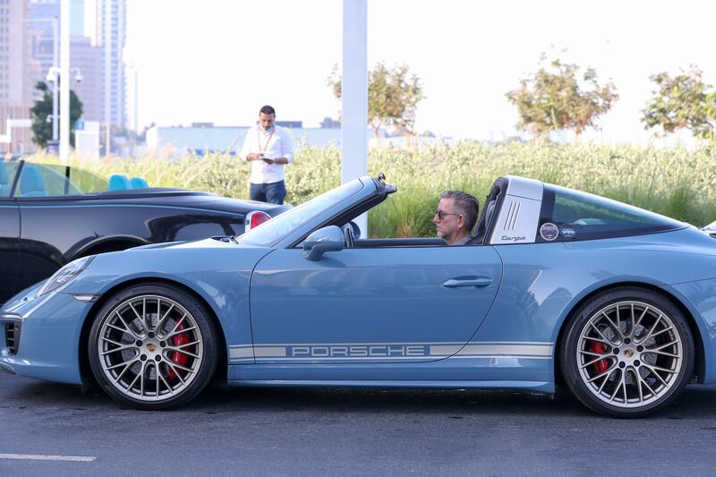 A Porsche 911 Targa in the parade. Khushnum Bhandari / The National