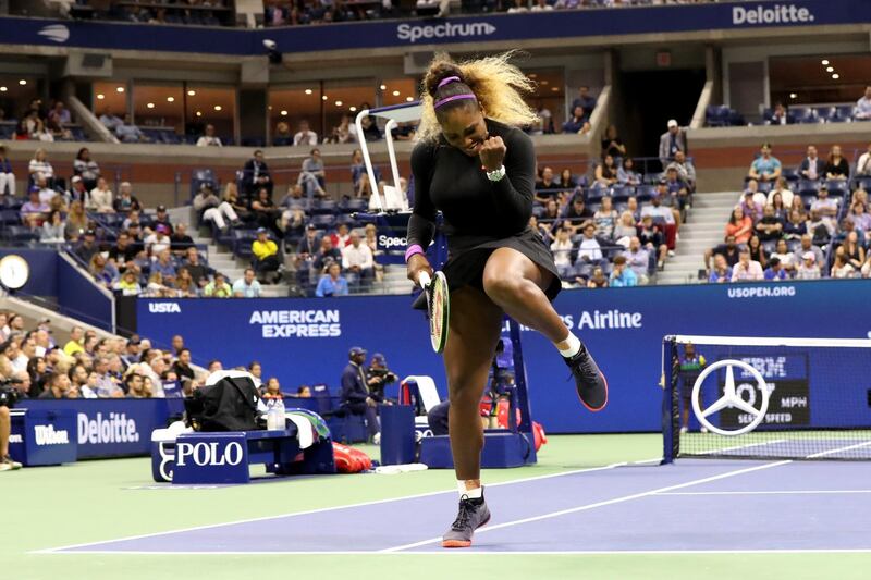 Serena Williams celebrates winning the secnd set against Catheirne McNally. AFP