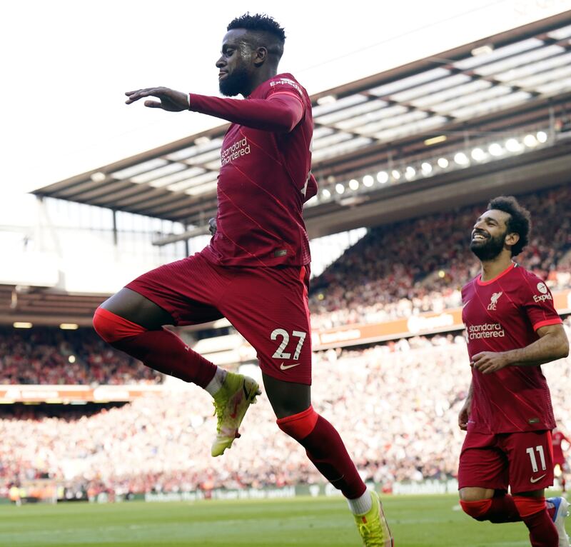 Divock Origi celebrates after scoring Liverpool's second. EPA