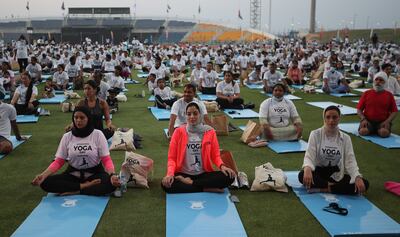 International Day of Yoga in Abu Dhabi last summer. The Indian diaspora is the largest in the Emirates at 3.5 million in 2021. EPA 