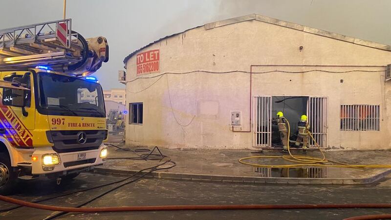 Firefighters contained a blaze at two warehouses in Deira on Tuesday. Dubai Civil Defence