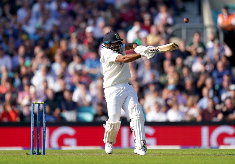 India's Shardul Thakur smashes a six off Ollie Robinson on his way to 57 off 36 balls. PA