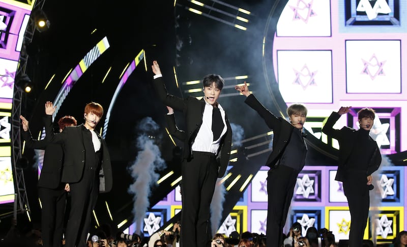 Band members perform on stage during the finals of the annual K-Pop World Festival in Changwon Stadium, South Korea, September 29, 2017. EPA