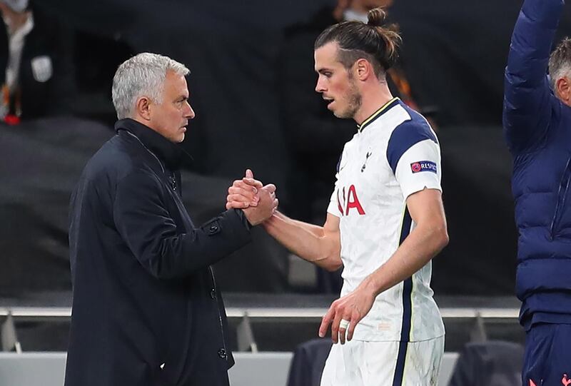 Gareth Bale shakes hands with Spurs manager Jose Mourinho after being substituted. EPA