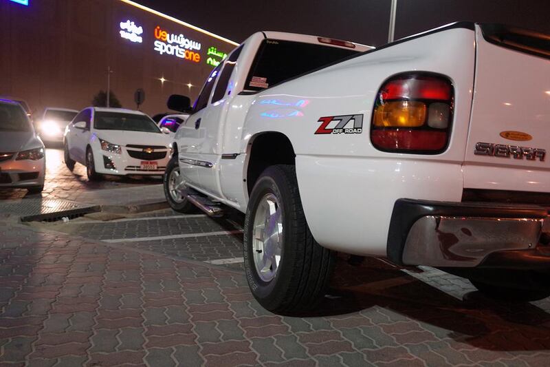 With parking spaces being few after iftar, some drivers park on the kerbs at Delma Mall after iftar on Wednesday, July 8, 2015, in Mussaffah.  Delores Johnson / The National