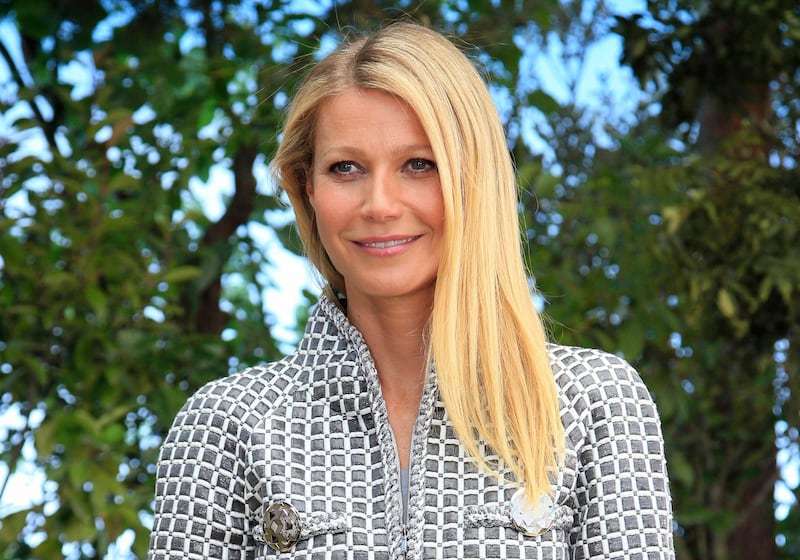 FILE - In this Jan. 26, 2016, file photo, Gwyneth Paltrow poses for photographers before Chanel's Spring-Summer 2016 Haute Couture fashion collection in Paris. A Utah man filed a lawsuit Tuesday, Jan. 29, 2019, accusing Paltrow of causing him brain injuries and broken ribs when she crashed into him at the Deer Valley Ski Resort in Park City, Utah in 2016. (AP Photo/Thibault Camus, File)