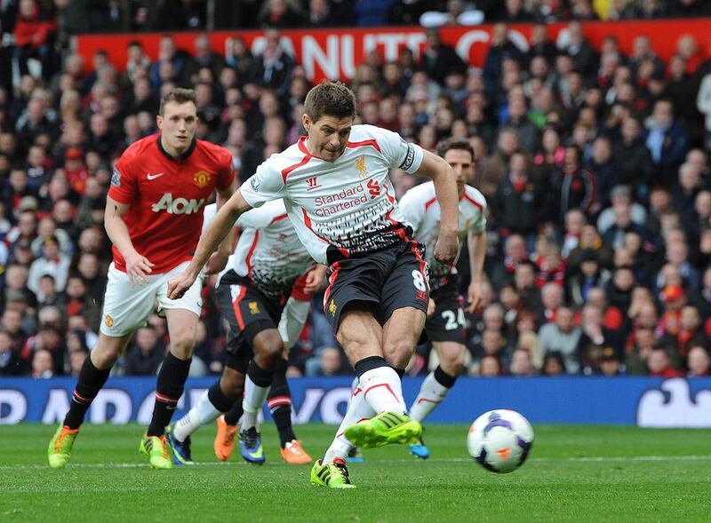 Liverpool's Steven Gerrard scores his second goal during during the English Premier League match against Manchester United at Old Trafford on 16 March 2014. Peter Powell / EPA