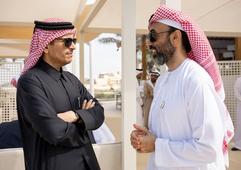 Sheikh Tahnoon bin Zayed, National Security Adviser, speaks with Qatari Foreign Minister Sheikh Mohammed bin Abdulrahman
