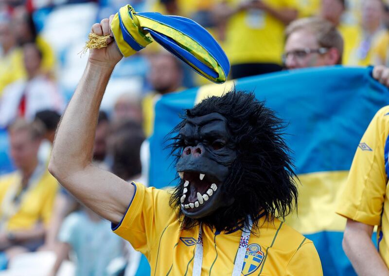 A Swedish supporter wearing an ape mask waits for the start of the group F match between Sweden and South Korea at the 2018 World Cup in the Nizhny Novgorod stadium in Nizhny Novgorod, Russia. Pavel Golovkin / AP Photo